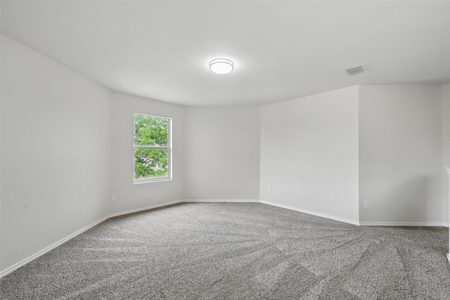 1126 Mazourka Dr, Arlington, TX 76001 - carpeted spare room with baseboards