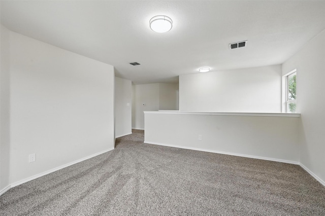 1126 Mazourka Dr, Arlington, TX 76001 - spare room featuring carpet and baseboards