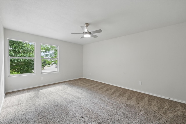 1126 Mazourka Dr, Arlington, TX 76001 - unfurnished room featuring carpet floors, a ceiling fan, and baseboards