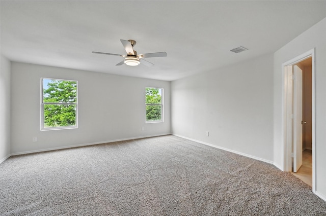 1126 Mazourka Dr, Arlington, TX 76001 - carpeted empty room with a ceiling fan and baseboards