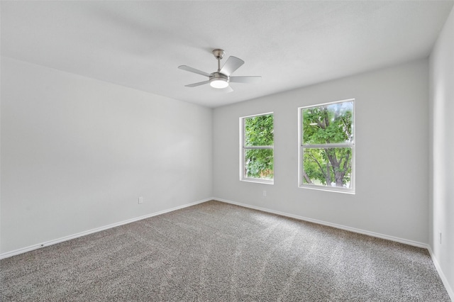 1126 Mazourka Dr, Arlington, TX 76001 - spare room featuring carpet, baseboards, and a ceiling fan