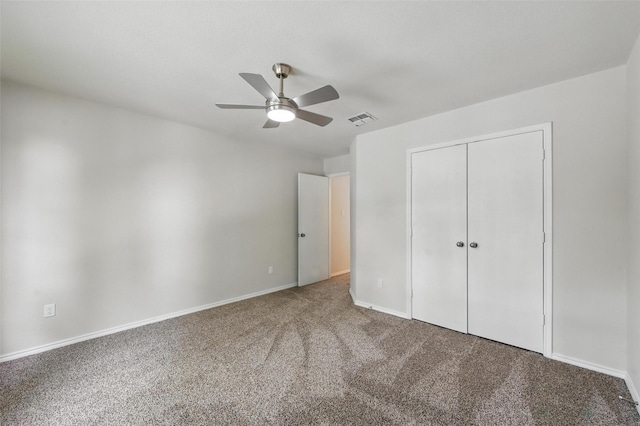 1126 Mazourka Dr, Arlington, TX 76001 - unfurnished bedroom featuring carpet floors, baseboards, a closet, and a ceiling fan
