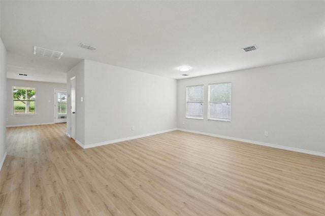 1126 Mazourka Dr, Arlington, TX 76001 - unfurnished room featuring light wood-style floors and baseboards