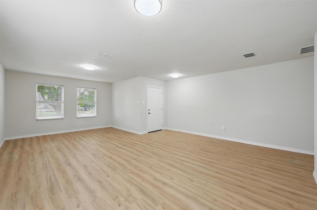 1126 Mazourka Dr, Arlington, TX 76001 - unfurnished room with light wood finished floors and baseboards