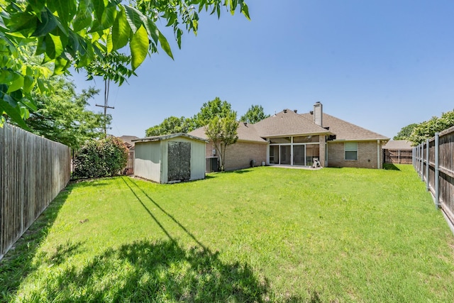 8300 Red Rose Trl, North Richland Hills, TX 76182 - back of property with a sunroom, brick siding, a chimney, and central AC