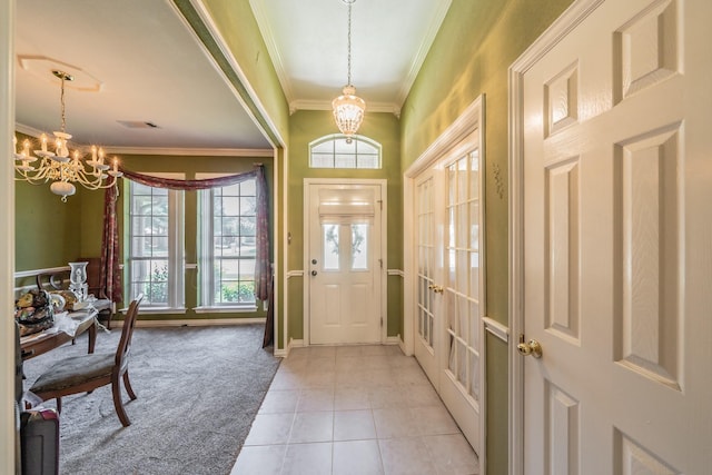 8300 Red Rose Trl, North Richland Hills, TX 76182 - foyer with a chandelier, ornamental molding, light carpet, light tile patterned floors, and baseboards