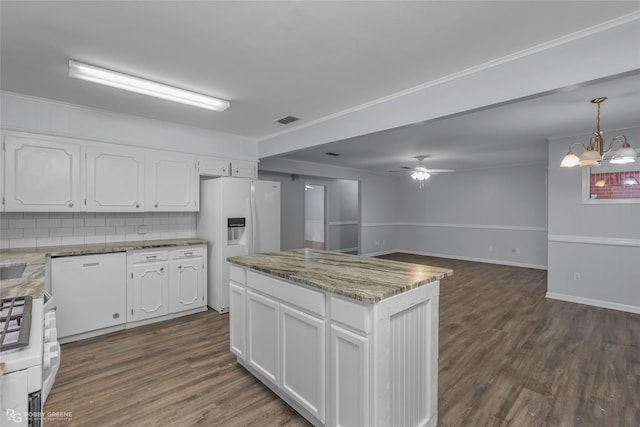 6309 River Rd, Shreveport, LA 71105 - kitchen featuring white appliances, white cabinets, ceiling fan, dark wood-style floors, and tasteful backsplash