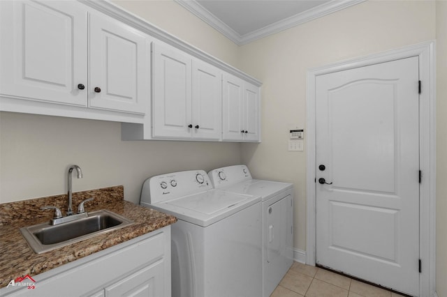 9445 N Pointe Cir, Greenwood, LA 71033 - washroom with washing machine and clothes dryer, ornamental molding, cabinet space, and light tile patterned flooring