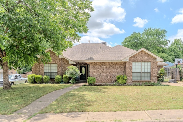 522 E Lanett Dr, Desoto, TX 75115 - view of front of property with brick siding and roof with shingles