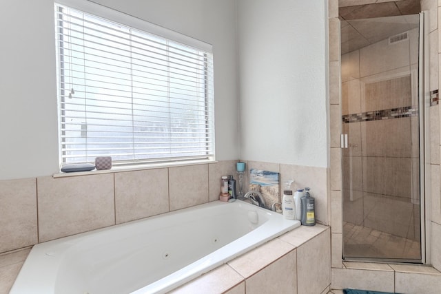 522 E Lanett Dr, Desoto, TX 75115 - bathroom with a shower stall and a jetted tub
