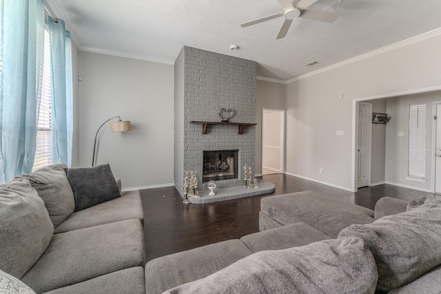 522 E Lanett Dr, Desoto, TX 75115 - living room featuring a ceiling fan, ornamental molding, wood finished floors, baseboards, and a fireplace