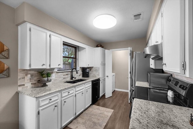 1210 Kay Dr, Weatherford, TX 76086 - kitchen with electric range oven, a sink, exhaust hood, dishwasher, and decorative backsplash
