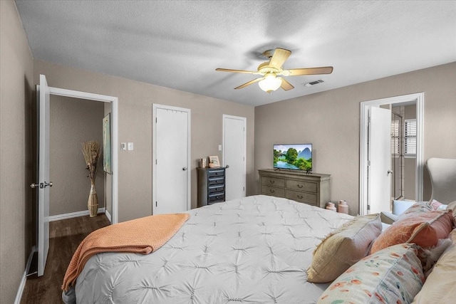 1210 Kay Dr, Weatherford, TX 76086 - bedroom with wood finished floors, baseboards, and ceiling fan