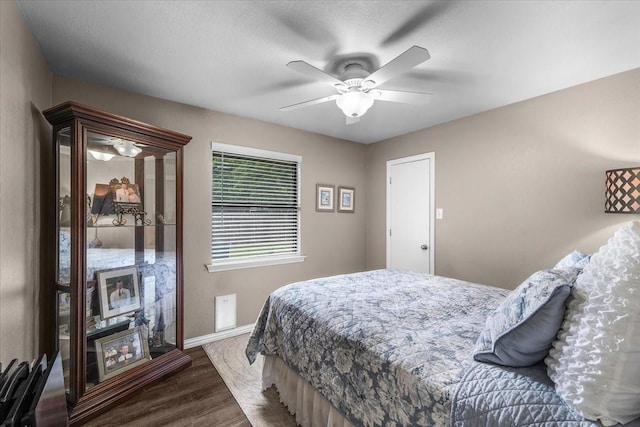 1210 Kay Dr, Weatherford, TX 76086 - bedroom with wood finished floors, baseboards, and ceiling fan