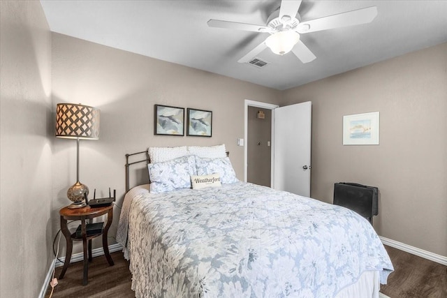 1210 Kay Dr, Weatherford, TX 76086 - bedroom with baseboards, dark wood-type flooring, and a ceiling fan