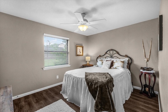 1210 Kay Dr, Weatherford, TX 76086 - bedroom featuring wood finished floors, baseboards, and a ceiling fan