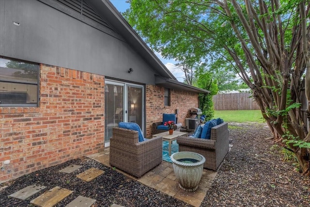 1210 Kay Dr, Weatherford, TX 76086 - view of patio featuring outdoor lounge area and grilling area