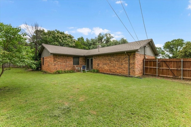 1210 Kay Dr, Weatherford, TX 76086 - back of property featuring brick siding