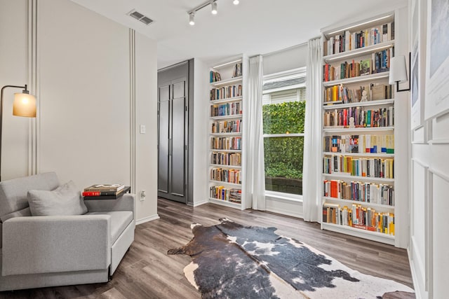 4932 Glenscape Trl, Fort Worth, TX 76137 - sitting room with wood finished floors and baseboards