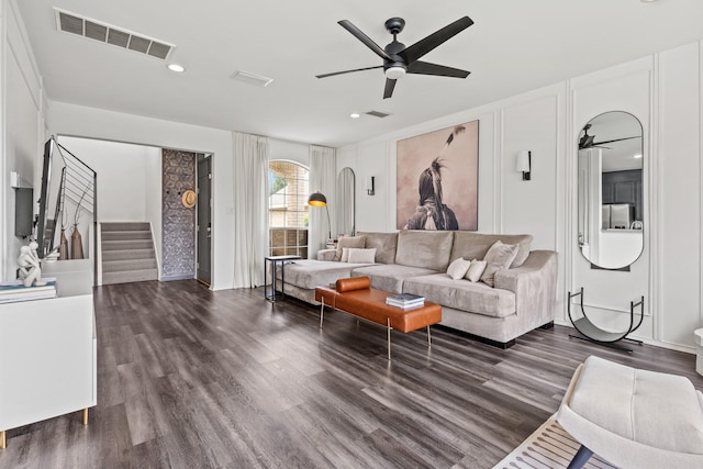 4932 Glenscape Trl, Fort Worth, TX 76137 - living room featuring ceiling fan, dark wood-style flooring, stairs, and baseboards