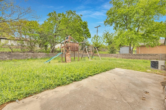 7401 Trimble Dr, Fort Worth, TX 76134 - view of yard featuring a playground and central air condition unit