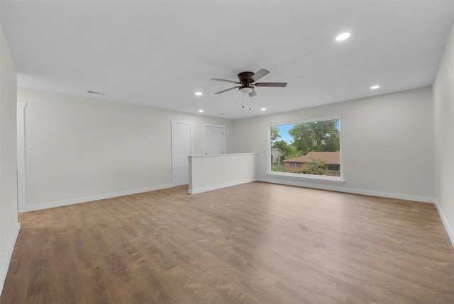 7401 Trimble Dr, Fort Worth, TX 76134 - unfurnished room with recessed lighting, ceiling fan, baseboards, and wood finished floors