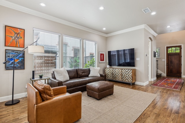 828 Lake Vista Pl, Coppell, TX 75019 - living area featuring wood finished floors, baseboards, ornamental molding, and recessed lighting