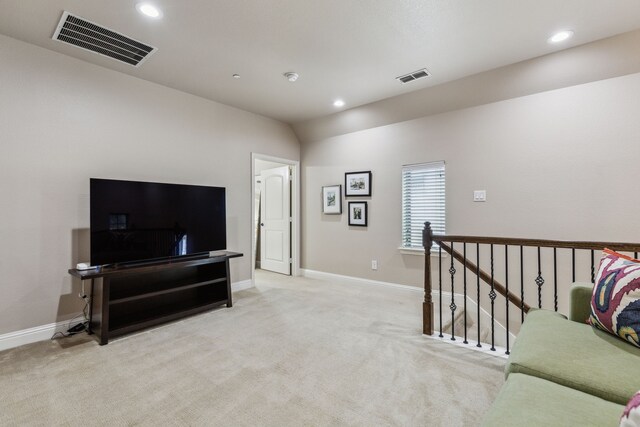 828 Lake Vista Pl, Coppell, TX 75019 - living area featuring light carpet, recessed lighting, baseboards, and vaulted ceiling
