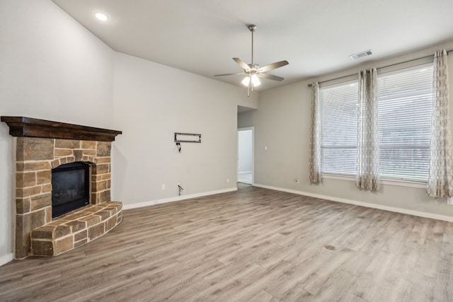 1529 Calcot Ln, Forney, TX 75126 - unfurnished living room with a ceiling fan, wood finished floors, baseboards, a fireplace, and vaulted ceiling
