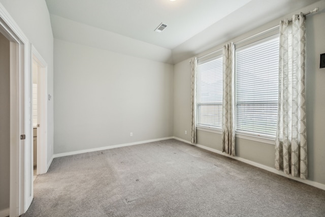 1529 Calcot Ln, Forney, TX 75126 - spare room featuring carpet flooring, vaulted ceiling, and baseboards