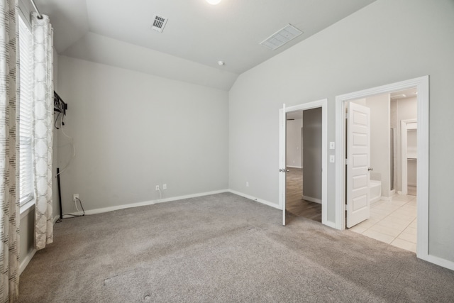 1529 Calcot Ln, Forney, TX 75126 - unfurnished bedroom featuring carpet flooring, vaulted ceiling, multiple windows, and baseboards