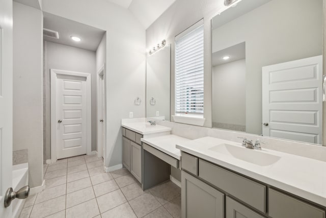1529 Calcot Ln, Forney, TX 75126 - bathroom featuring double vanity, a bath, tile patterned flooring, and baseboards