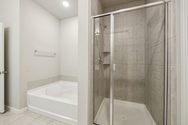 1529 Calcot Ln, Forney, TX 75126 - bathroom with a garden tub, a shower stall, and tile patterned flooring