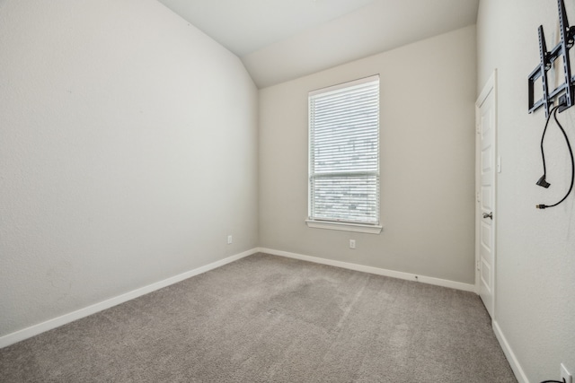 1529 Calcot Ln, Forney, TX 75126 - carpeted empty room with baseboards and vaulted ceiling