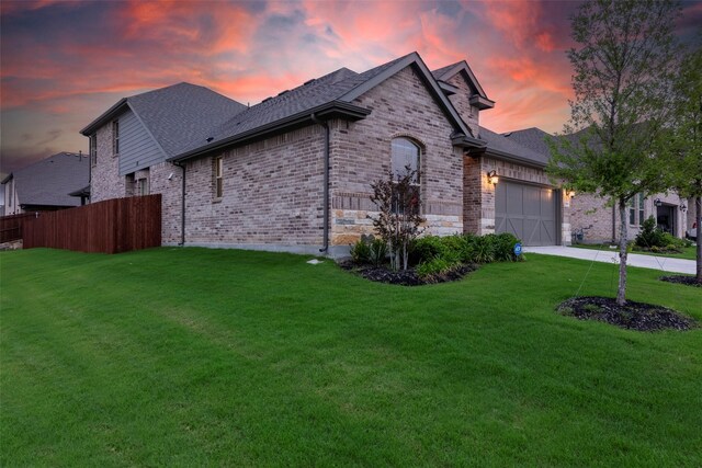 3036 Lionsgate Dr, Argyle, TX 76226 - view of home's exterior with brick siding, a garage, a shingled roof, and concrete driveway