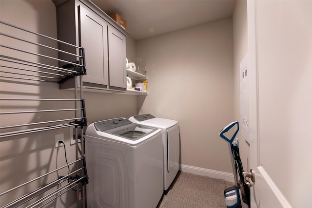 3036 Lionsgate Dr, Argyle, TX 76226 - laundry area with cabinet space, washer and clothes dryer, carpet floors, and baseboards