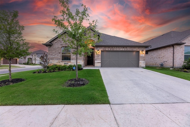 3036 Lionsgate Dr, Argyle, TX 76226 - french provincial home with an attached garage, concrete driveway, a lawn, brick siding, and roof with shingles
