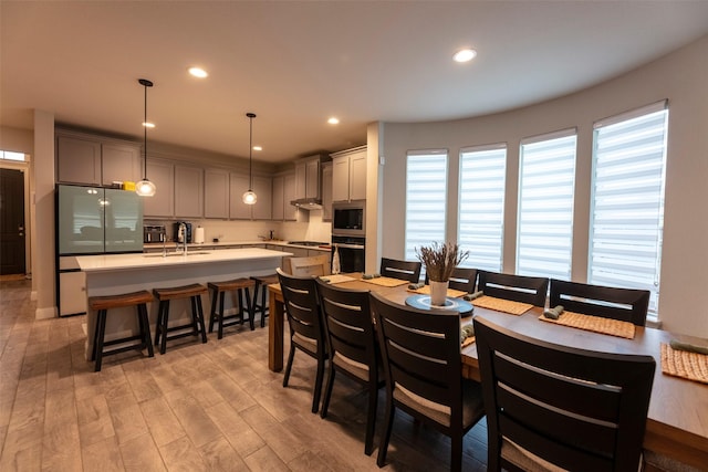 3036 Lionsgate Dr, Argyle, TX 76226 - dining area with light wood finished floors and recessed lighting