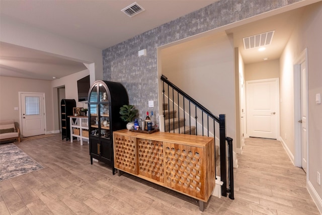 3036 Lionsgate Dr, Argyle, TX 76226 - hallway with wood finished floors, baseboards, and stairs