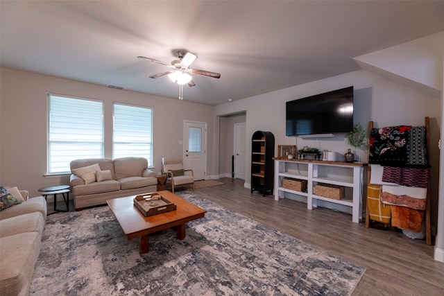 3036 Lionsgate Dr, Argyle, TX 76226 - living area featuring a ceiling fan, wood finished floors, and baseboards