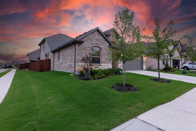 3036 Lionsgate Dr, Argyle, TX 76226 - french country home with concrete driveway, brick siding, a garage, and roof with shingles
