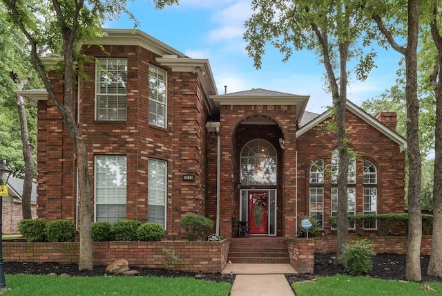 2805 Pine View Dr, Grapevine, TX 76051 - view of front of house featuring brick siding and a chimney