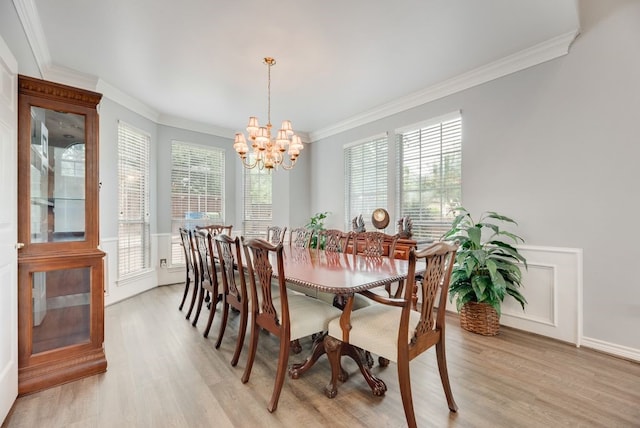 2805 Pine View Dr, Grapevine, TX 76051 - dining room featuring crown molding, light wood-style floors, a chandelier, and plenty of natural light