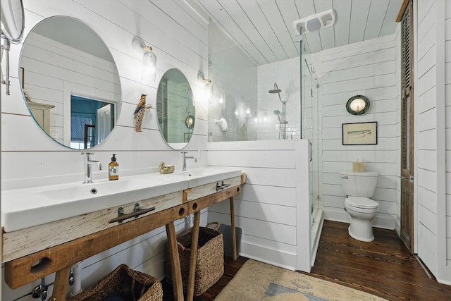 505 N College St, Mckinney, TX 75069 - bathroom with hardwood / wood-style floors, toilet, a shower stall, and double vanity