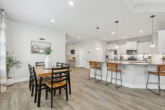 1601 Stetson St, Northlake, TX 76247 - dining area with light wood finished floors, recessed lighting, and baseboards