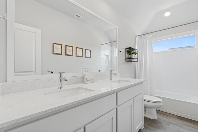 1601 Stetson St, Northlake, TX 76247 - full bath with toilet, double vanity, shower / bathtub combination with curtain, vaulted ceiling, and wood finished floors