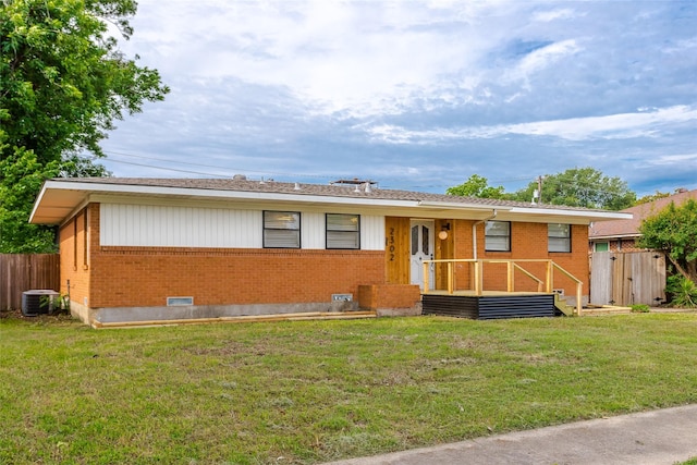 2302 Mockingbird Ln, Garland, TX 75042 - ranch-style home with brick siding and central air condition unit