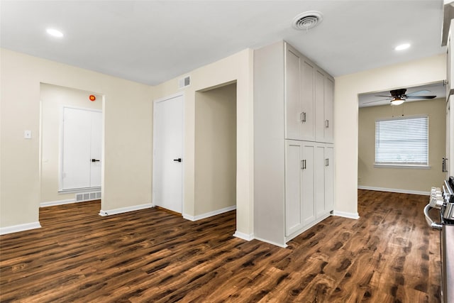 2302 Mockingbird Ln, Garland, TX 75042 - corridor featuring dark wood-style floors, baseboards, and recessed lighting