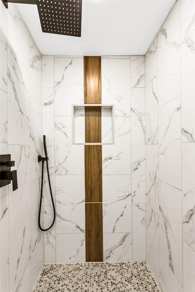 2302 Mockingbird Ln, Garland, TX 75042 - bathroom featuring a marble finish shower