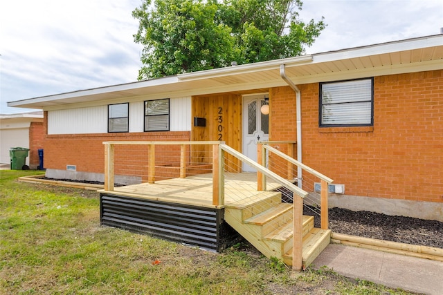 2302 Mockingbird Ln, Garland, TX 75042 - view of front facade with brick siding and crawl space